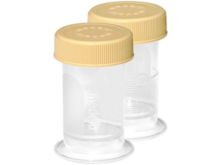 Two disposable 35 ml Medela Colostrum Containers with lids.