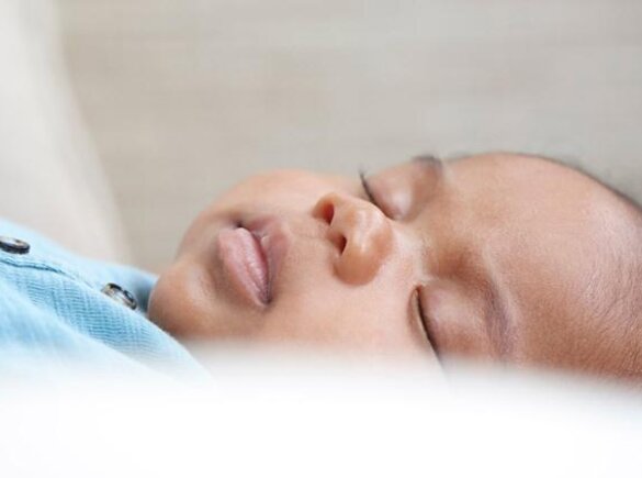 Close-up of a sleeping baby boy.