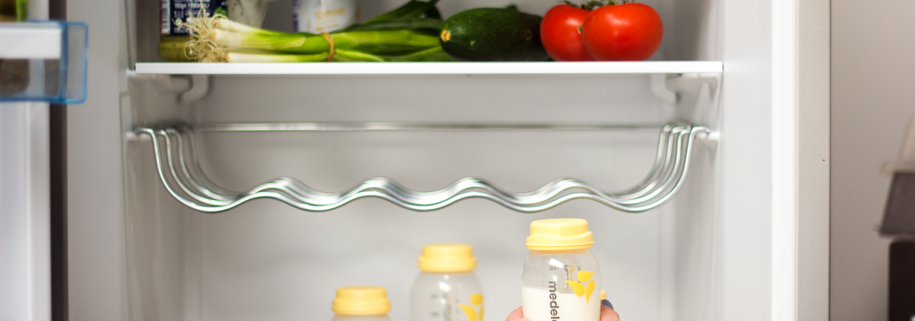 Prepared breast milk storage bottles in the fridge