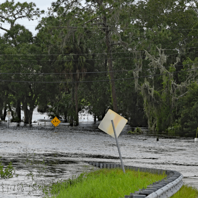 River overflowing and flooding streets.