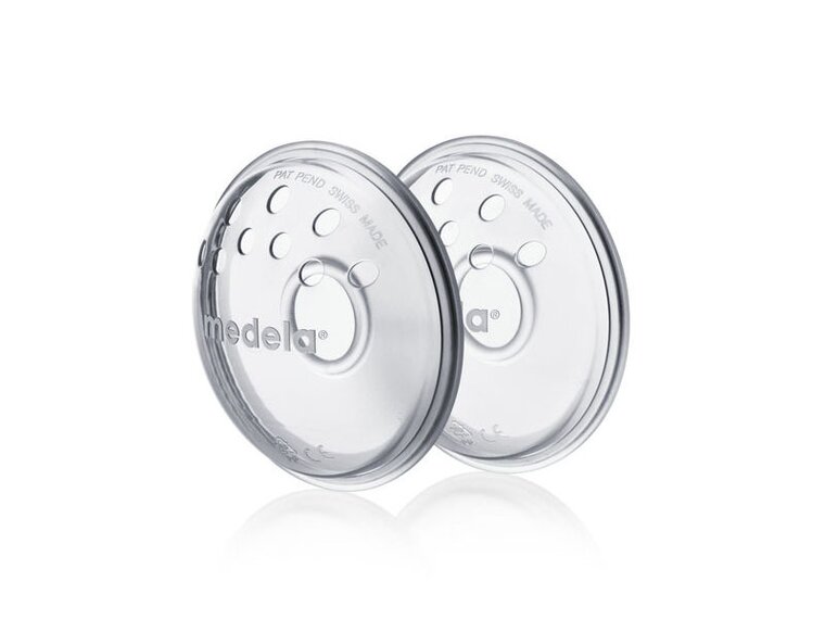 Breast shells Angled view of a pair of Medela Breast shells.